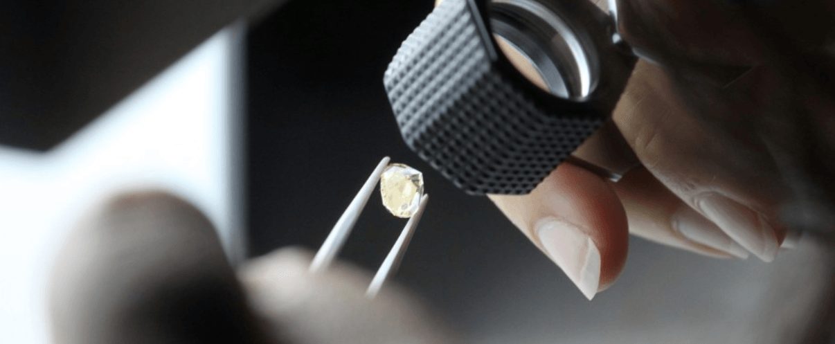 A diamond being securitized by a Gemmologist A diamond being securitized by a Gemmologist